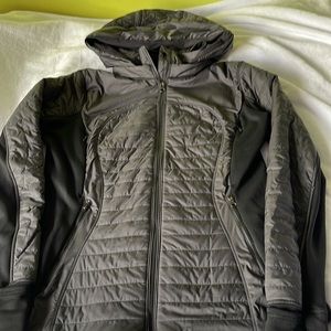 Lululemon zip up jacket with hood.